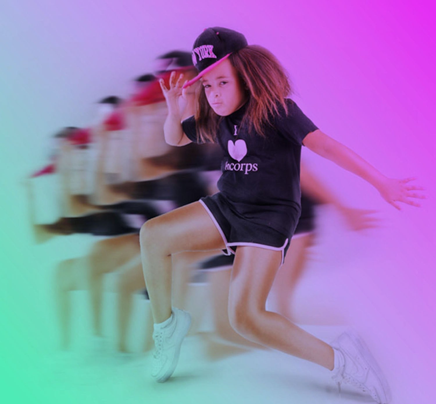 young girl dancing wearing Encorps t-shirt