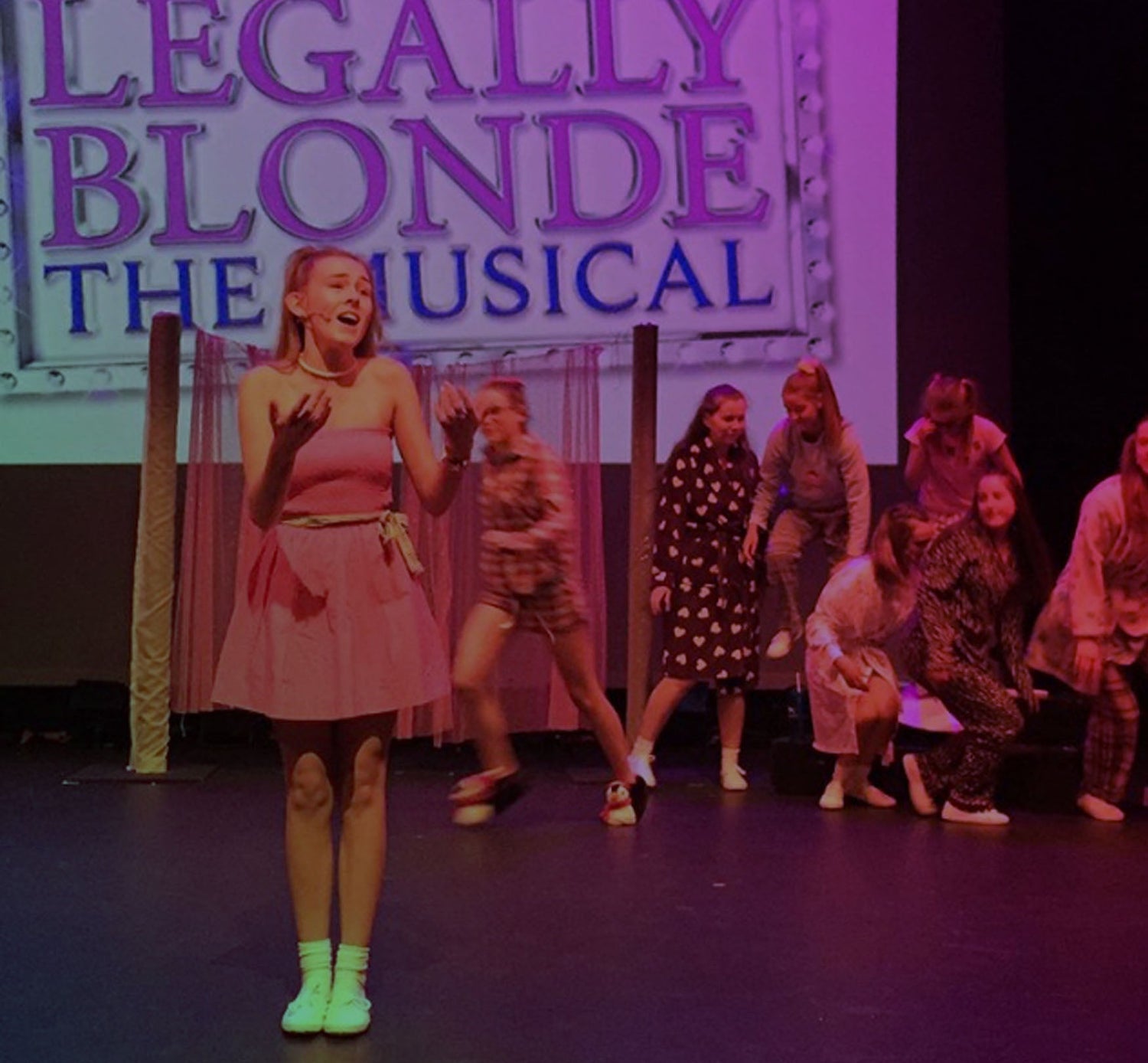 Girl Performing Musical on Stage