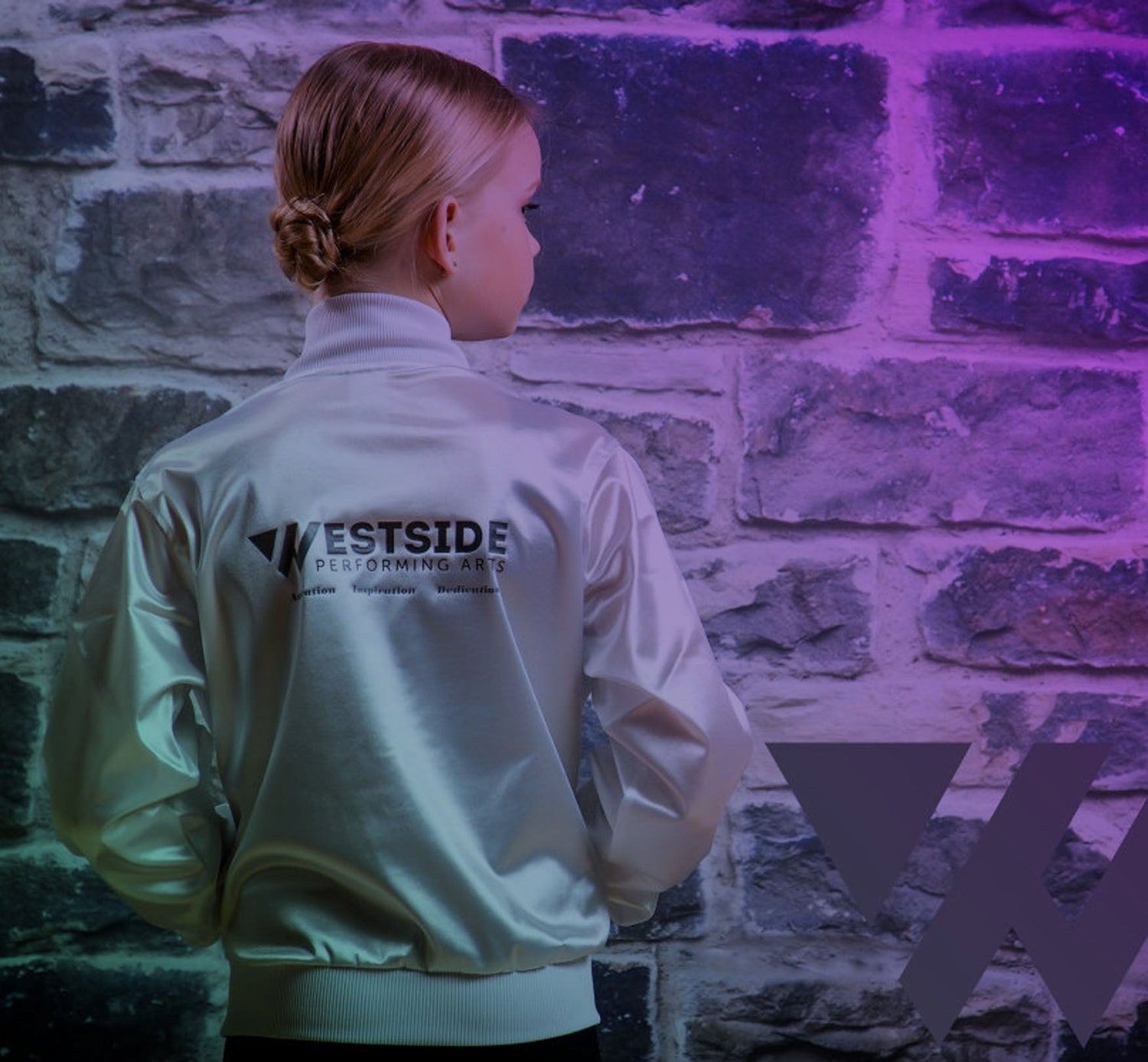 Girl wearing dancing jacket looking at the side