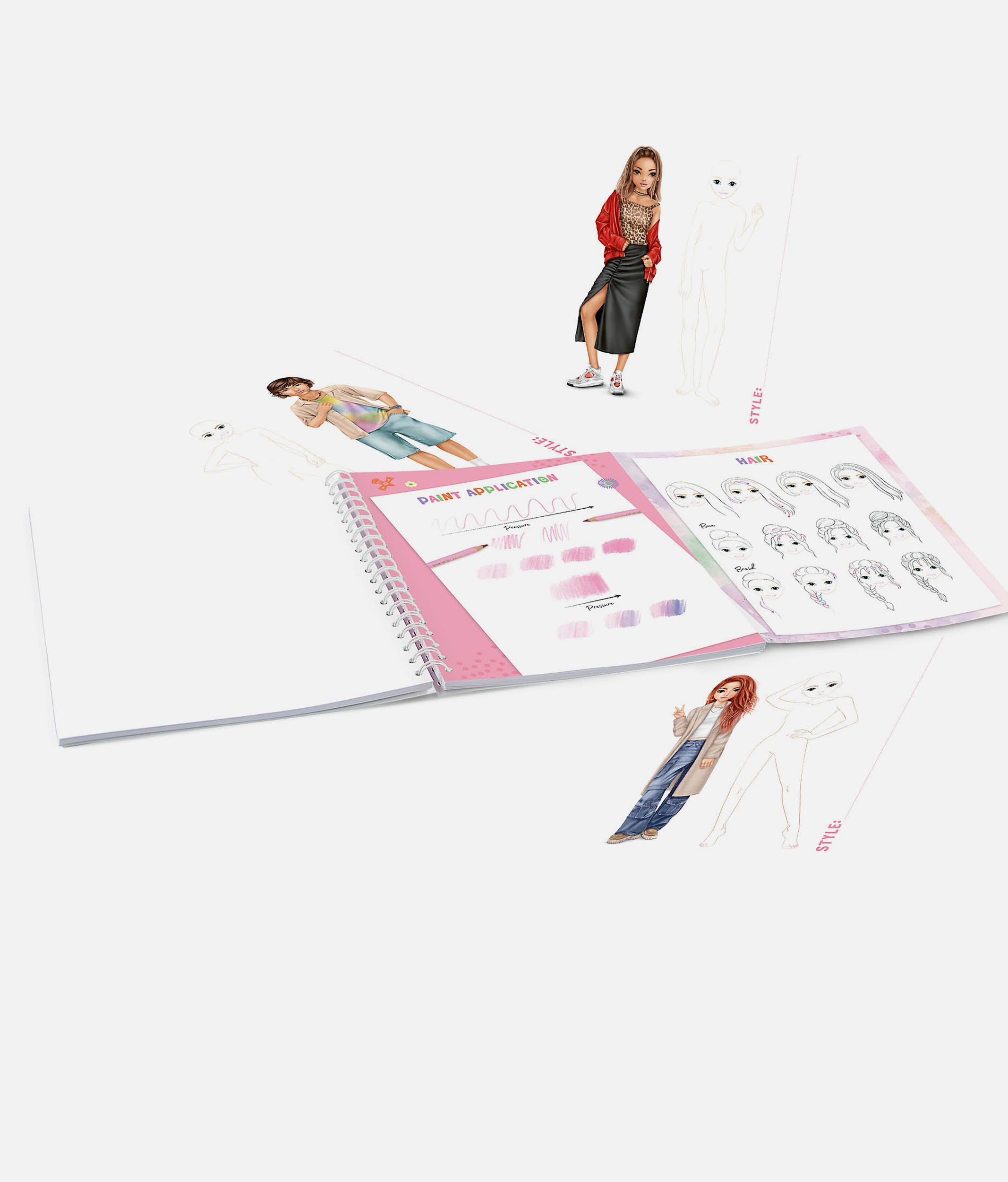 Open planner with fashion design illustrations on a white background